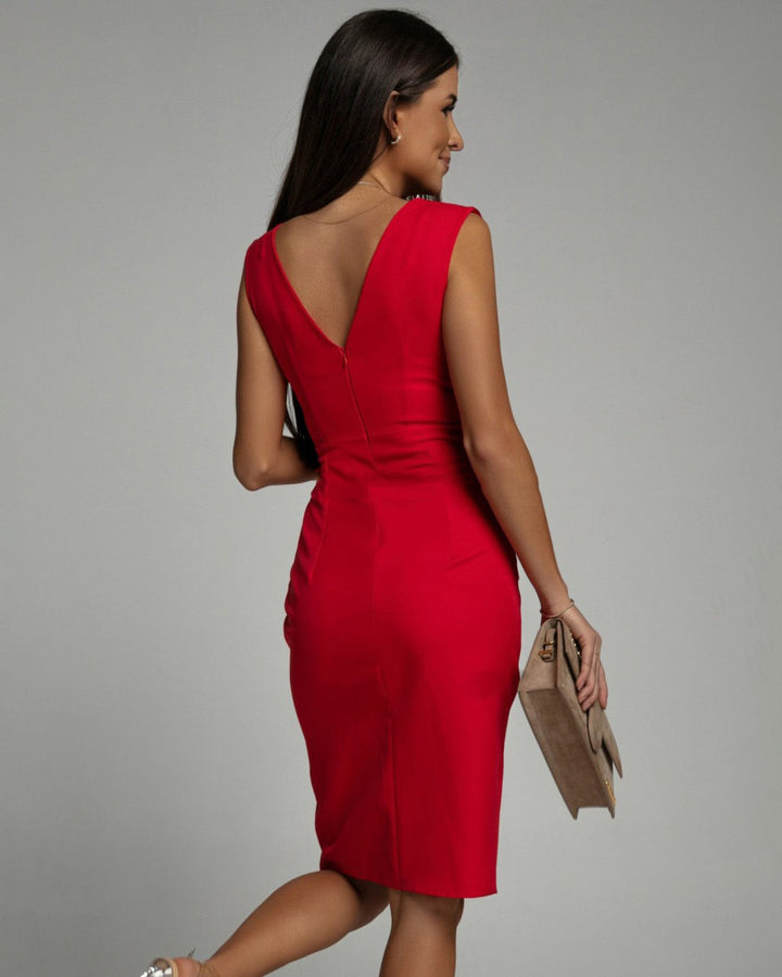 Fitted dress with V-neckline and slit