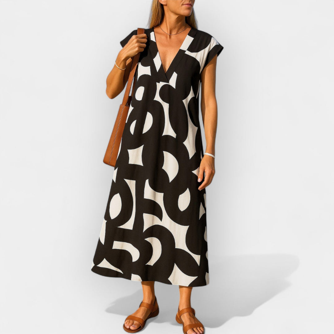 Airy Dress with V Neckline and Modern Design